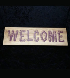Read more about the article Wood Log Welcome Sign